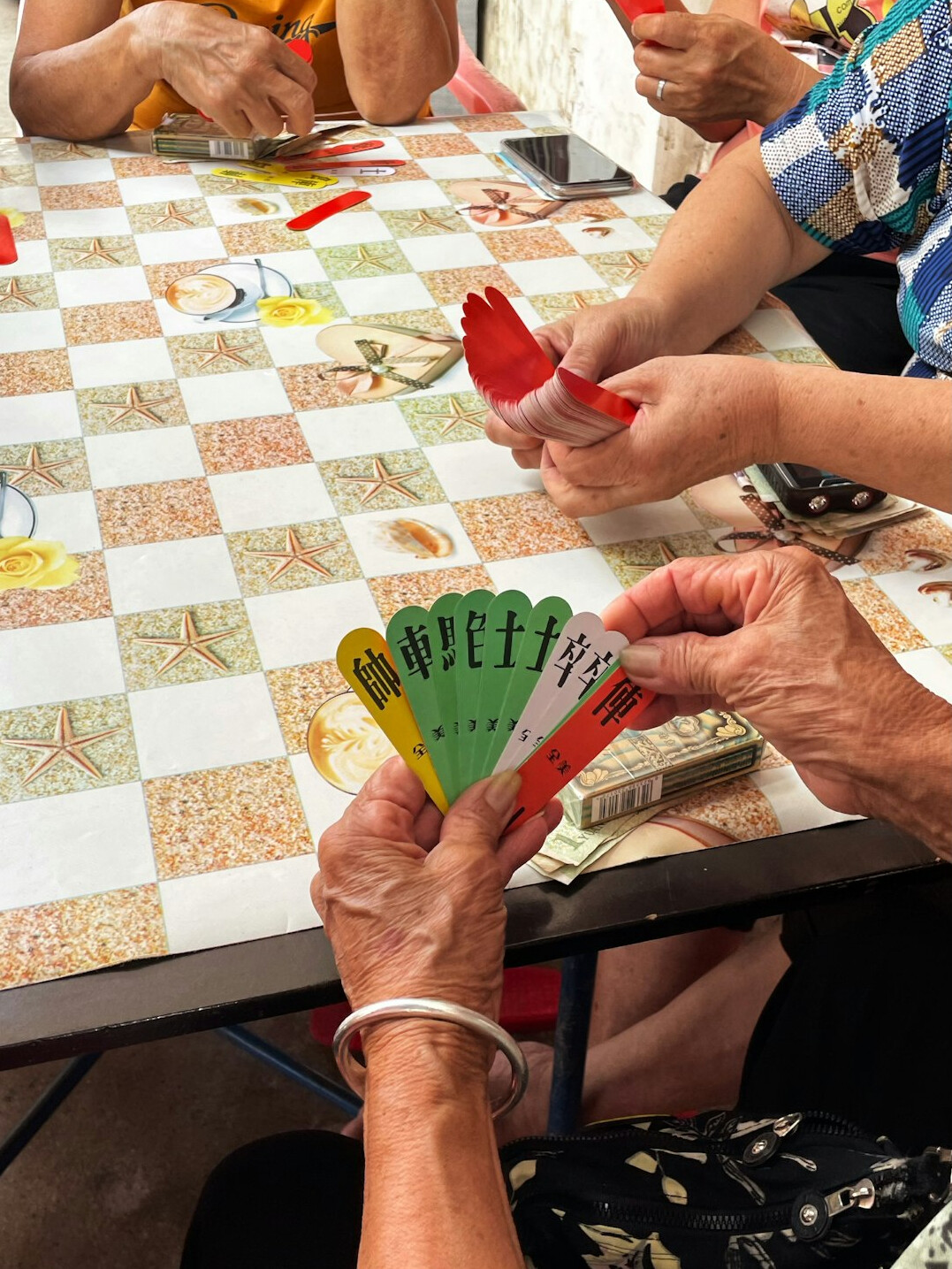 seniors playing cards together