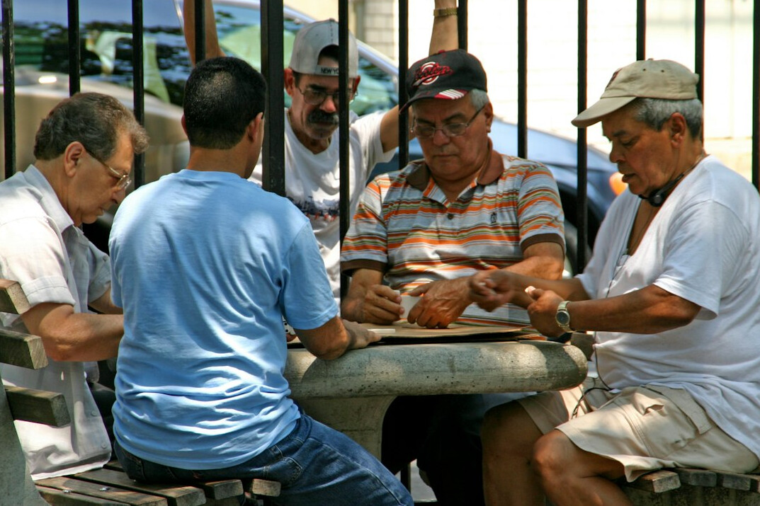 group of seniors playing cards
