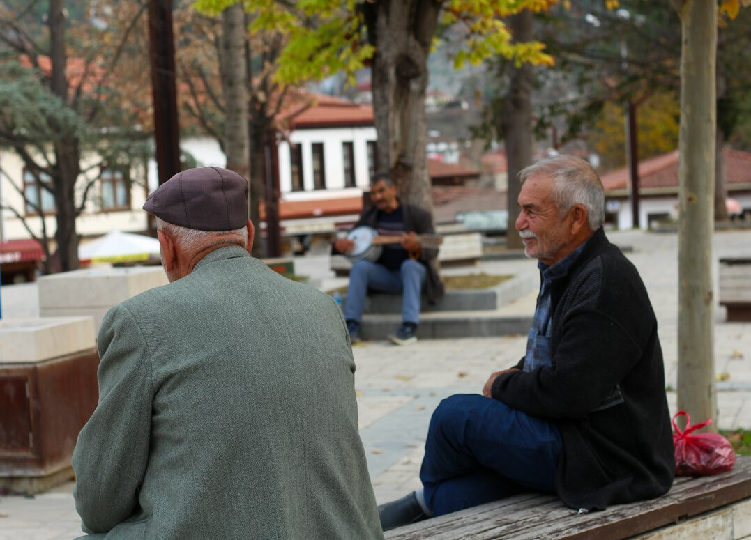 senior people chatting in neighborhood