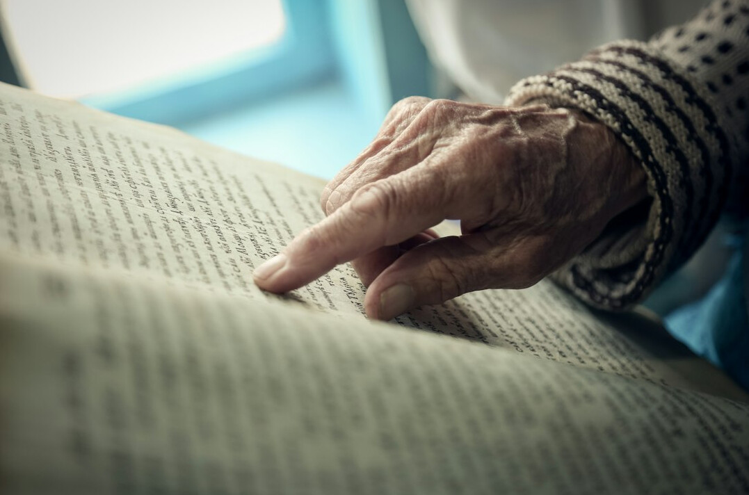 senior woman reading book
